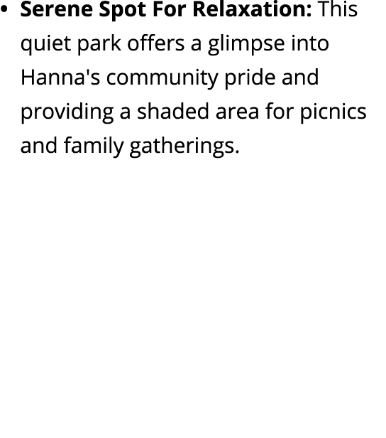 Serene Spot For Relaxation: This quiet park offers a glimpse into Hanna's community pride and providing a shaded area...