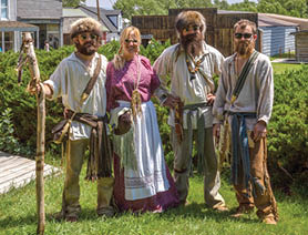 Two men are standing in a field, looking at a map. AI generated content
